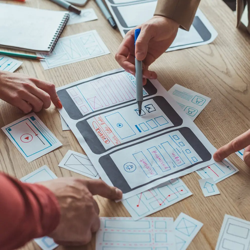 A team working on the layout of a web site.